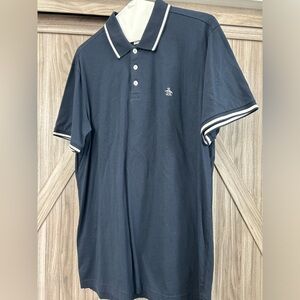 An original Penguin polo, size Large